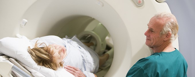 Woman about to receive a CT scan