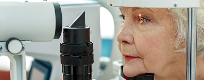 Elderly lady having an eye examination