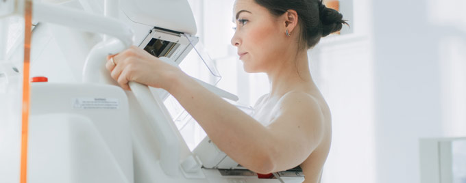 Woman receives a mammogram