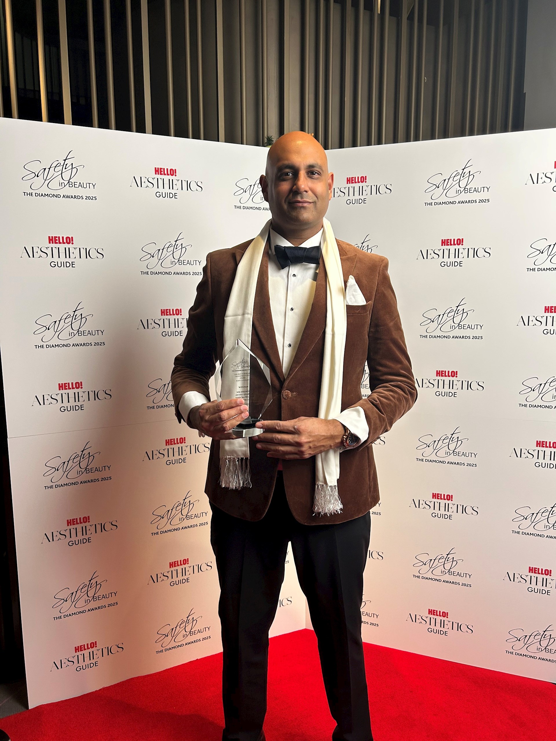 Mr Hrsikesa Sharma holding his Diamond Award at the Safety in Beauty Awards