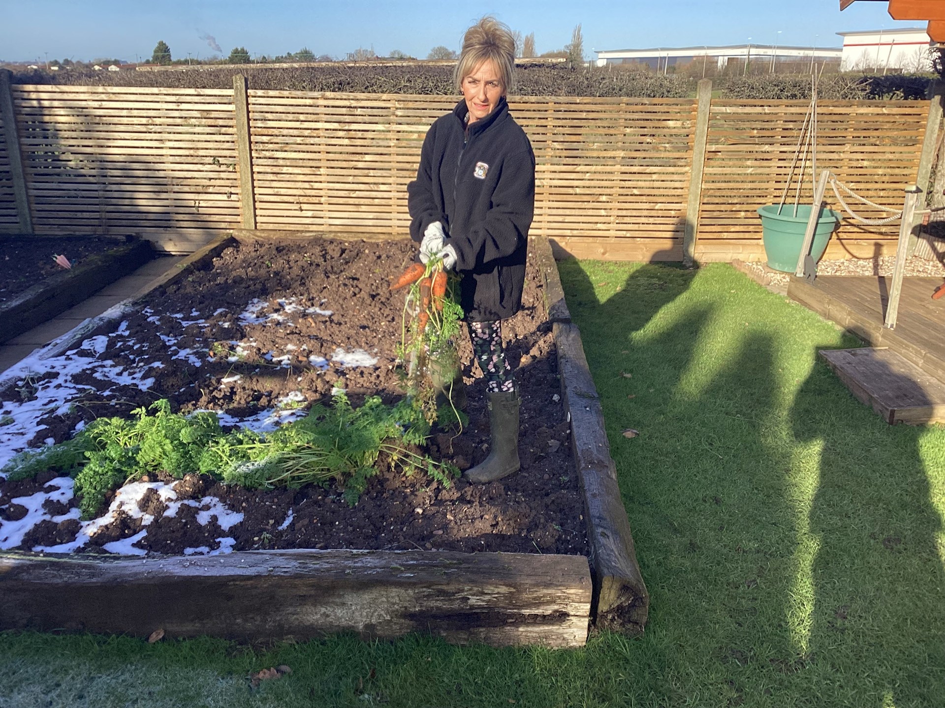 Karen Harley gardening after thumb joint replacement surgery