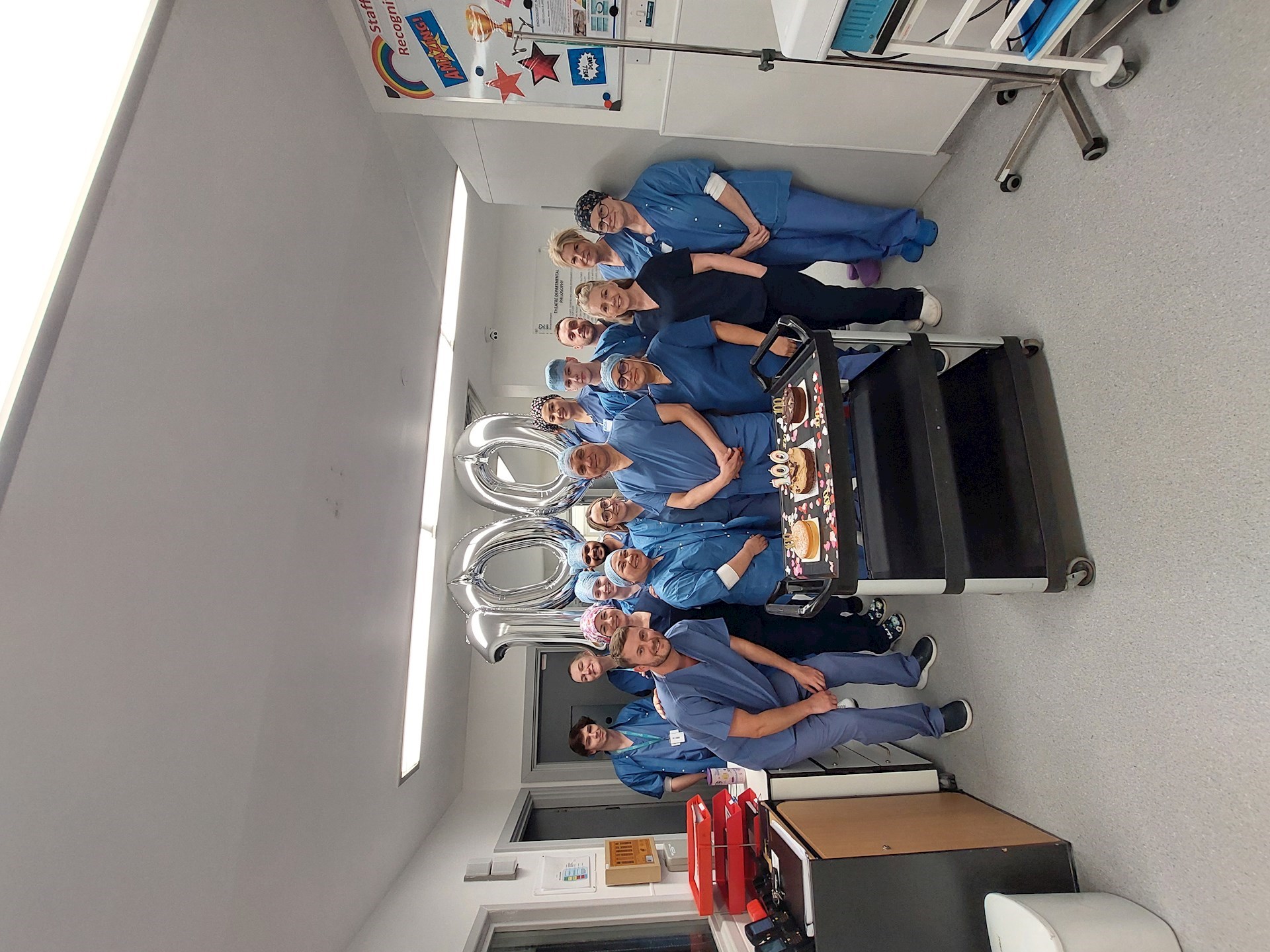 Theatre team at Spire Murrayfield Hospital Wirral celebrating 100 robotic surgery cases
